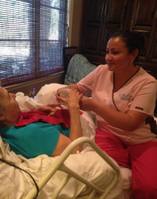 a caregiver serving an senior