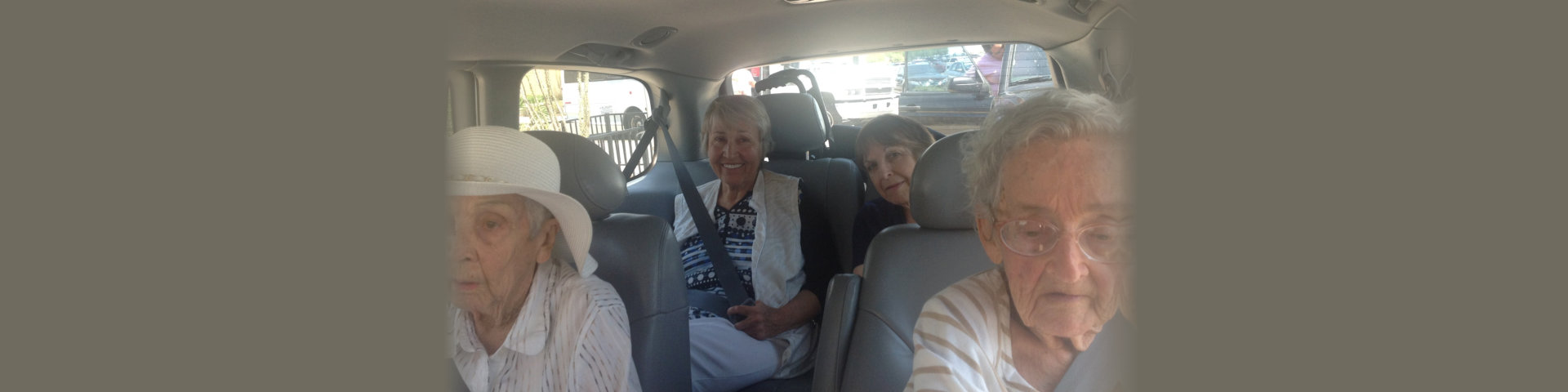 group of seniors inside the car