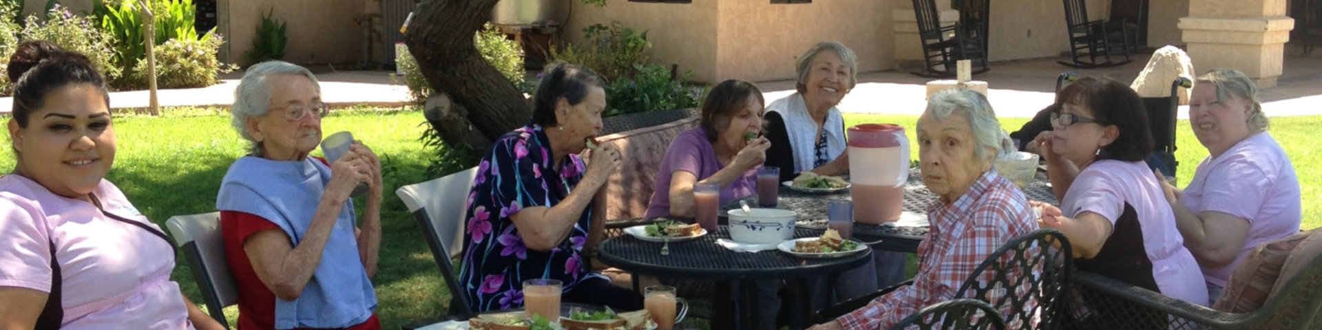 elderly ladies eating outdoors